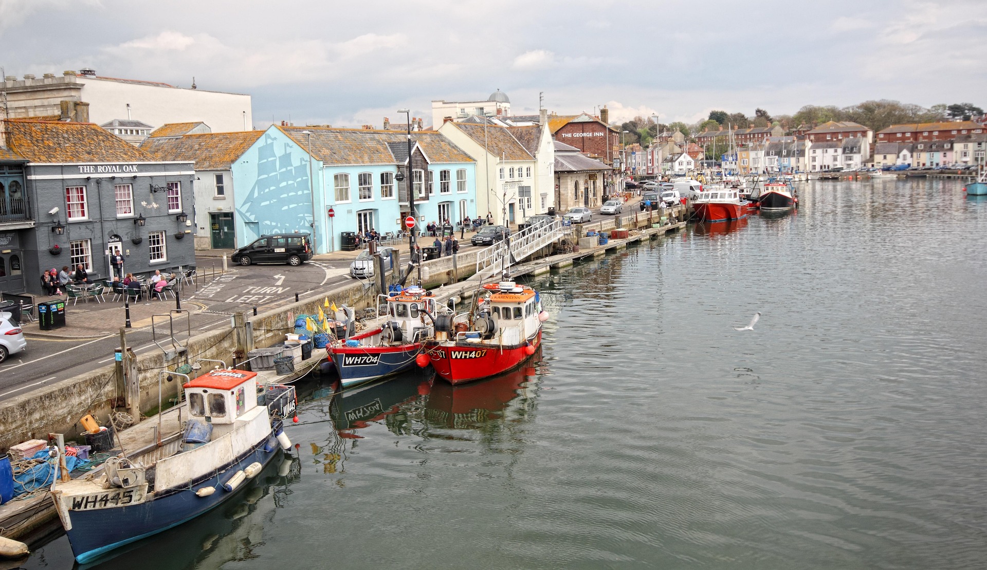 Pubs and colourful buildings along Weymouth harbour